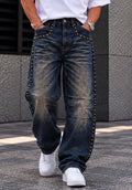 Jeans Baggy Washed con Profilo di Borchie sui Fianchi