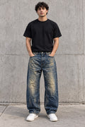 Jeans Baggy Blue Denim con Lavaggio Vintage e Graffiature